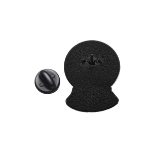 Macro shot of black enamel pin back with durable rubber butterfly clutch fastener