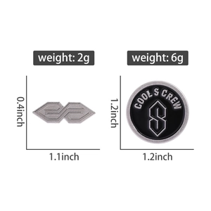 Detailed view of silver S-shape pin and round Cool S Crew black enamel badge dimensions