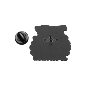 Detailed back view of a black enamel pin with matte finish and rubber clutch backing
