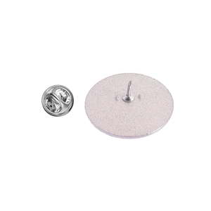 Detail of silver metal brooch base with pin and butterfly clutch backing set