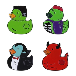 Halloween-themed duck enamel pins set featuring Frankenstein, Vampire, and Zombie styles