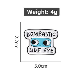 Detail view of Bombastic Side Eye enamel pin with dimensions 3.0cm by 2.2cm