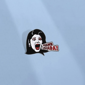 Cartoon punk enamel pin featuring screaming lady and maldita lisiada text for backpacks