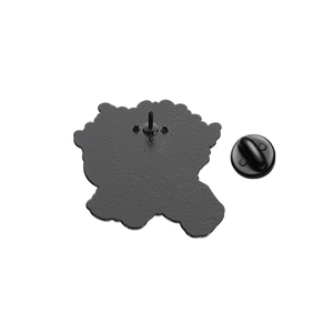 Detailed back view of a black enamel pin showing the zinc alloy base and rubber clutch