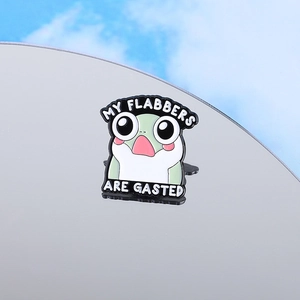 Cute cartoon frog enamel pin featuring 'MY FLABBERS ARE GASTED' slogan in light green