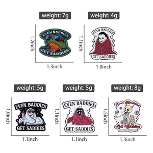 Cartoon enamel pin set with frog and skeleton designs including product dimensions