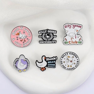 Set of 6 cartoon white goose enamel pins with Silly Goose slogans on white background