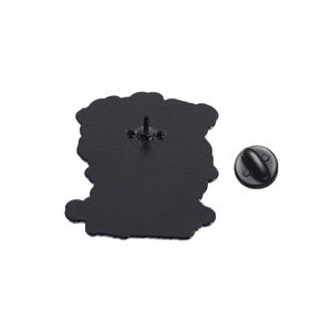 Back view of black matte metal cartoon brooch showing pin needle and rubber clutch
