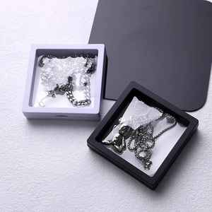 Transparent PE film suspension jewelry box with bear pendant and Cuban chain necklaces