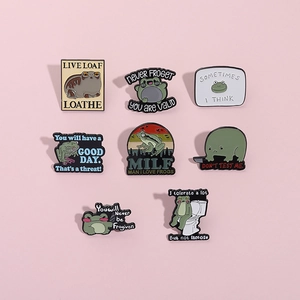 Set of 8 funny cartoon frog enamel pins with humorous puns on light pink background