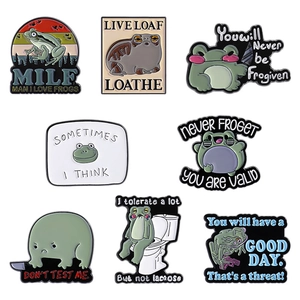 Set of 8 cute green frog enamel pins with funny phrases and quirky cartoon designs