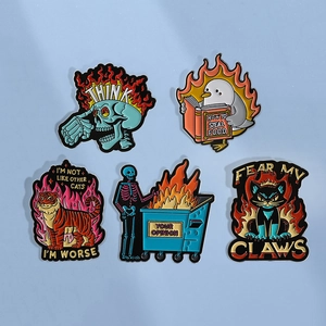 Five assorted enamel pins featuring dark humor cartoon skull and animal motifs