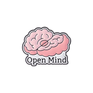 Detail of pink enamel brain pin featuring Open Mind text and a polished zinc alloy finish