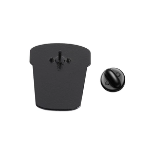 Detail view of the black enamel brooch metal pin back and matching rubber clutch closure