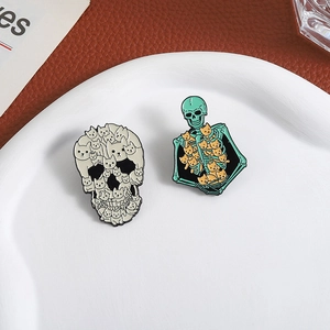 Gothic skull and cat enamel pin set on a ceramic plate with high-quality metal finish