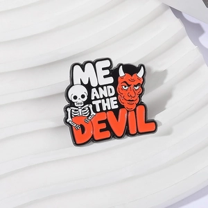Dark style Me and the Devil enamel pin featuring skull and red devil head designs