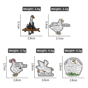 Detail view of cute enamel goose brooches with specific weight and size measurements