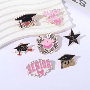 2025 graduation enamel pin set featuring senior class motifs and doctor hats with flowers