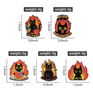 Set of funny black cat enamel pins showing weight and size specs for creative badges