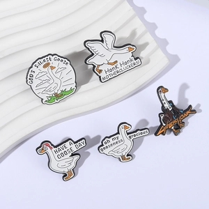 Set of 5 humorous white goose enamel pins with creative slogans on a wavy display