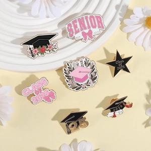 7-piece 2025 graduation enamel pin set with black and pink academic caps and stars