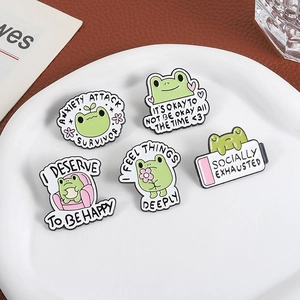 5er-Set Frosch-Emaille-Pins mit Zitaten zur psychischen Gesundheit auf Keramikteller