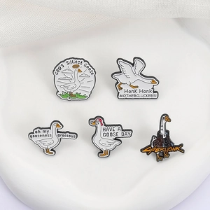 Five-piece set of funny white goose enamel pins with quirky designs and bright colors