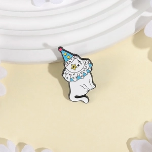 Circus clown white cat enamel brooch with blue hat and yellow star on cream background