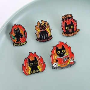 Set of 5 cartoon black cat enamel pins featuring fire motifs and creative arson slogans