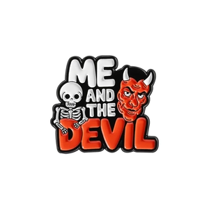 Gothic skull enamel brooch with Me and the Devil artistic text in bold metal finish