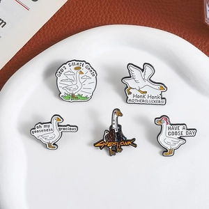 Set of 5 humorous white goose enamel pins featuring creative designs and funny slogans