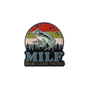 Cute green frog enamel pin featuring a forest sunset design with humor text for backpacks