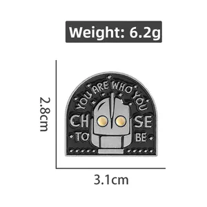 Detail shot of The Iron Giant enamel pin showing 3.1cm width and 2.8cm height dimensions