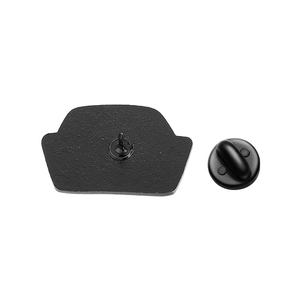 Detailed back view of a black nurse cap enamel pin with a sharp needle and rubber clutch