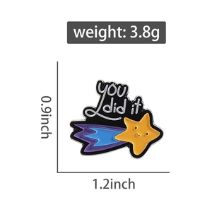 Detail of yellow star enamel pin with You Did It text and precise size measurements