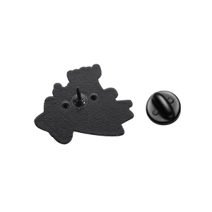 Detailed back view of star badge featuring a black metal textured base and rubber clutch