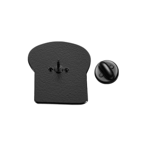 Detail view of the black metal brooch back with secure rubber butterfly clutch closure