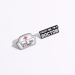 Minimalist nurse hat and doctor enamel pins with Trust Me I'm A Nurse and Doctor text