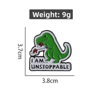 Detailed size and 9g weight view of the green dinosaur enamel pin with I AM UNSTOPPABLE text