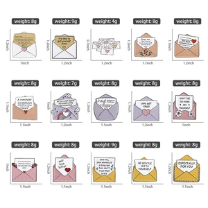 Detailed grid of envelope enamel pins with floral hearts and self-care slogans