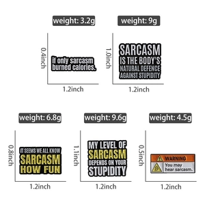 Detailed view of sarcastic enamel pins with precise dimensions and weight measurement