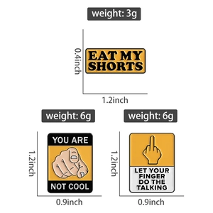 Detailed size and weight view of humorous enamel pins with text and hand gestures