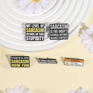 Set of five sarcastic enamel pins in black and yellow with humorous English quotes