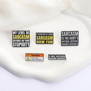 Set of five creative black and white enamel pins with humorous English sarcasm quotes