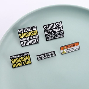 Set of five creative sarcasm enamel pins with funny quotes and unique warning signs