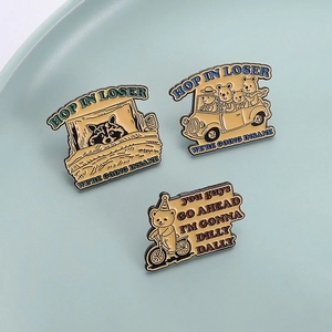 Three-piece cartoon raccoon enamel pin set featuring bears on bikes and retro typography
