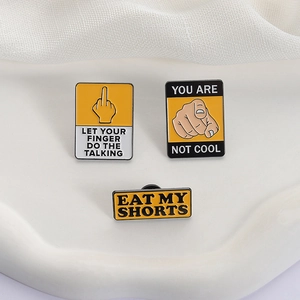 Three-piece yellow warning sign enamel pin set with witty slogans on stone tray
