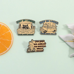 Three-piece set of funny raccoon enamel pins with humorous text on green background
