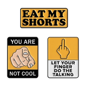 Three-piece yellow street style enamel pins set with bold black lettered warning slogans