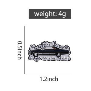 Detailed view of the black vintage car enamel pin dimensions measuring 1.2 by 0.5 inches